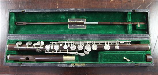 A Rudall Carte & Co. rosewood flute, no. 7340, flute 26.5in.